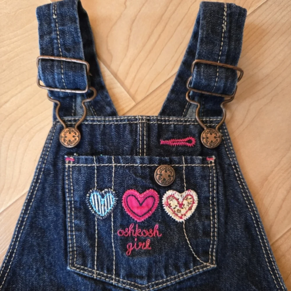 OshKosh B'Gosh dark blue denim overalls with applique patchwork hearts